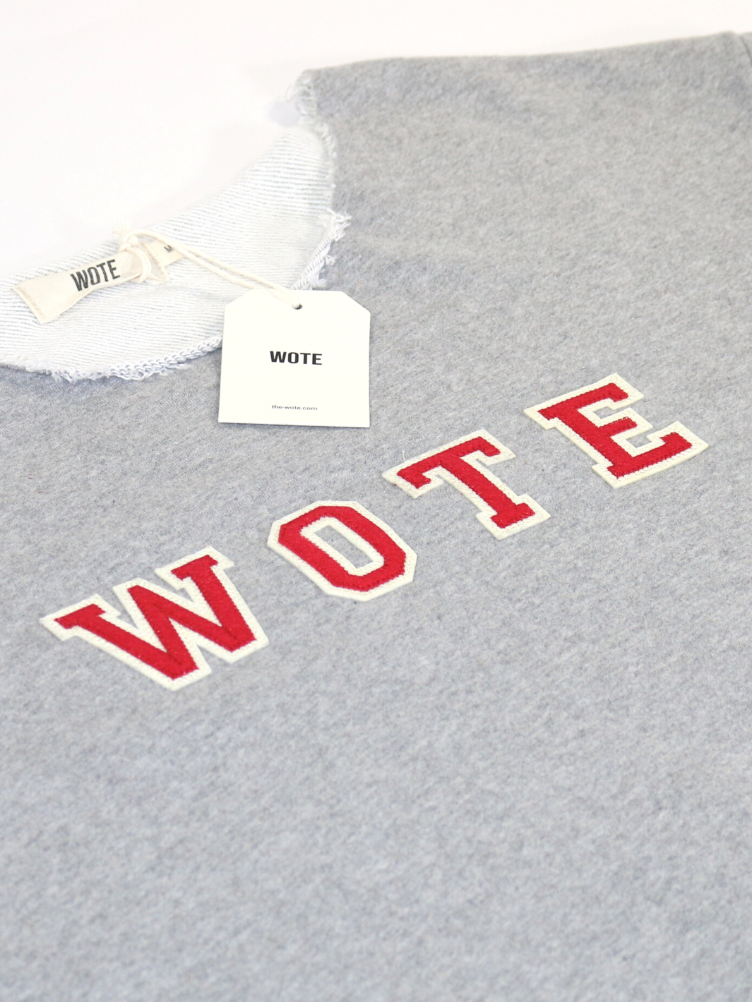 Unisex Halbarm Sweatshirt grau melange abgetrennten Kragen roter WOTE Logo Applikation Größe S - XXL